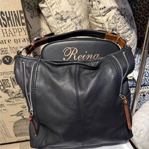 Nino BOSSI Black and Brown Shoulder Bags Sleek Design